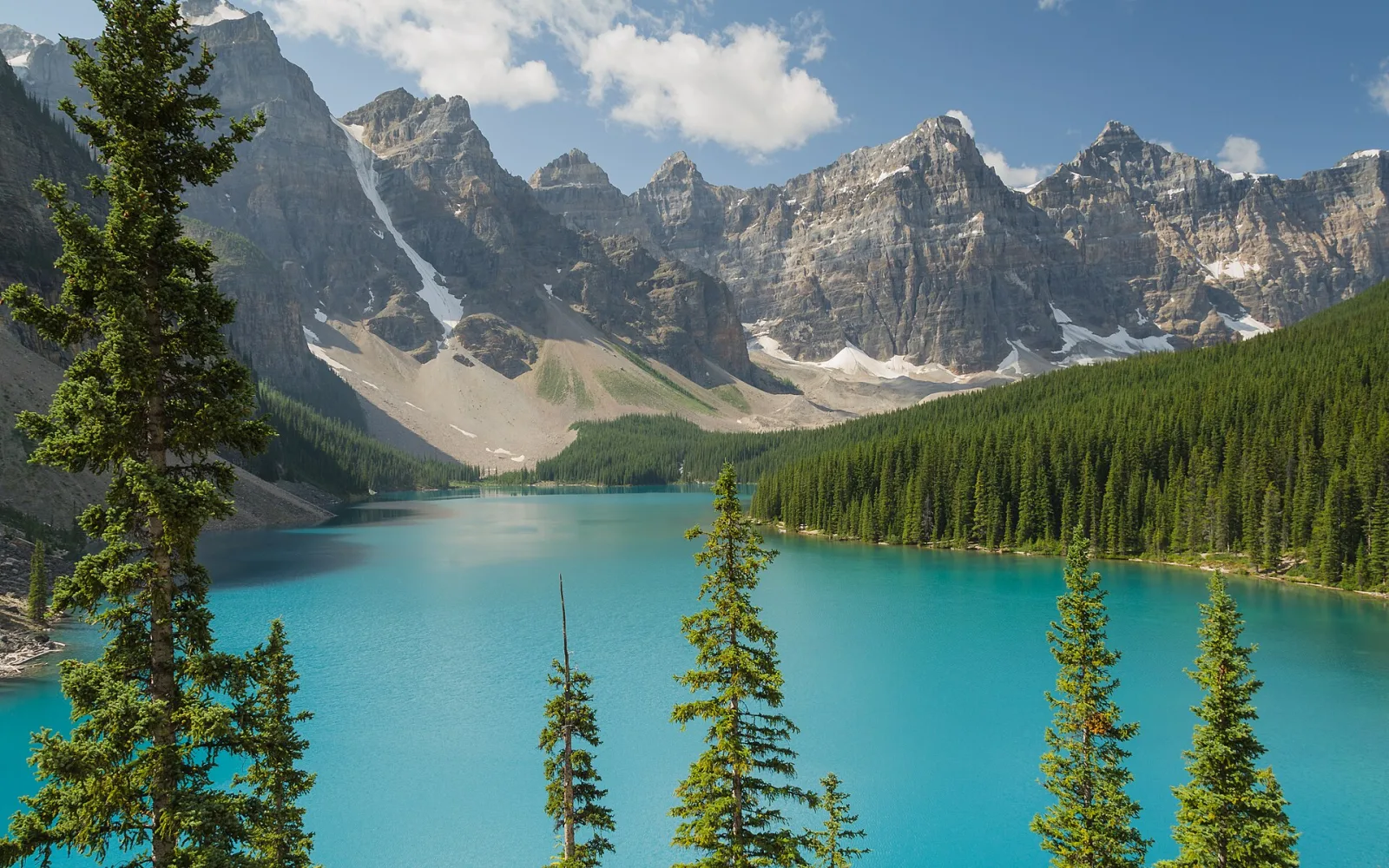The turquoise water of Moraine Lake beneath the Valley of the Ten Peaks, Banff